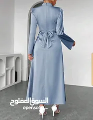  2 فستان جديد لونه ازرق نوع القماشه ستان طويل وليس مخايل ليس قصير جوده القماش كويسه نظيفه