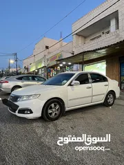  6 كيا اوبتما لوتسي 2009 لون ابيض بحالة جيدة جدا