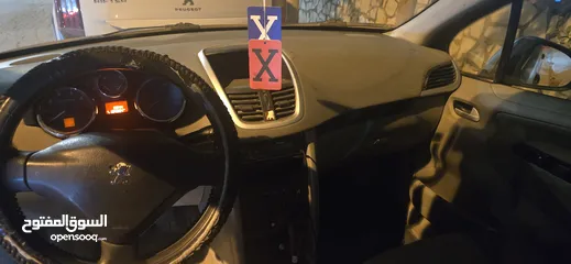  5 بيجو 207 / لون فضي/ بنزين