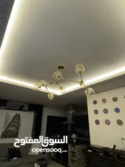  3 ثريا مودرن ذهبية بثمان رؤوس زجاج – من محل MECASA Khalda