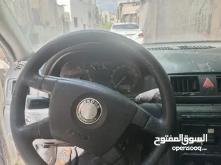  8 سكوده اكتافيه موديل 2002 ديزل جير عادي اصل عمومي لون ابيض مطور 1900 جير ومطور شغلات ميه ميه