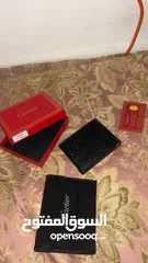  1 Cartier crocodile skin wallet