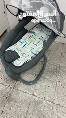  1 Baby stroller and bouncer