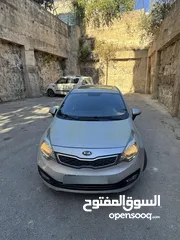 2 كيا برايد/ريو موديل 2014 فُل فتحة سقف شركة