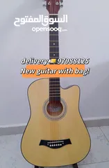  5 New acoustic guitar, with bag and picks, delivery