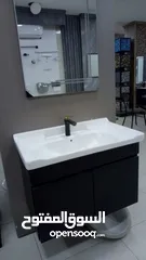  12 مغسلة مع خزانة ومرآة حمام