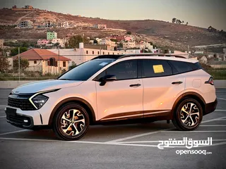  11 كايا سبورتاج /2022 فل الفل فتحة سقف  2x4 ///240Hp بنزين + كهرباء  ( Haybrid) 1600cc