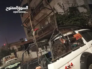  16 رول بار مع سلة وشبك (غرفة شبك) لبك اب ميتسوبيشي من موديل 2000 ولغاية 2006 بحالة الوكاله