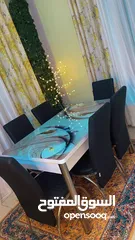  1 طاوله سفر 6 مقاعد و كورنر قهوه و مرجيحه حجم كبير