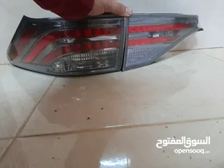  1 اضوية لكزس ct200 h  بحال الجديد وشانجان وتوسان