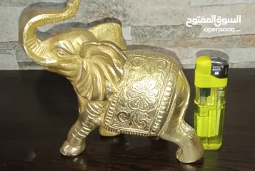  8 فيل نحاس منقوش