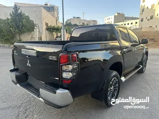  9 ميتسوبيشي L200 سبورتيرو موديل 2022 أعلى صنف مع ديفلوك للبيع
