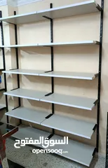  1 رفوف خشب وسلات محلات وأجهزة باركود
