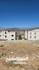  5 1 دونم على طريق اربد جرش القديم مباشره بعد مبنى المحافظه على اليسار