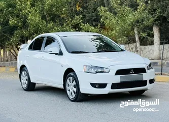  5 ميتسوبيشي لانسر موديل 2015 ماتور 1600 جير اوتماتيك استخدام شخصي