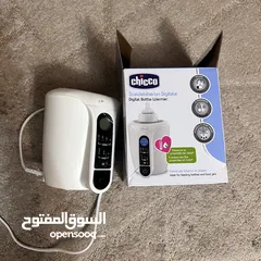  2 جهاز تسخين الرضاعة للبيبي ديجيتال Chicco bottle    السعر 20 دينار warmer