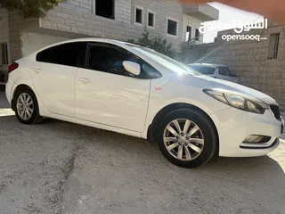 5 كيا k3 سيراتو 2014 مع فتحة سقف نخب بنزين