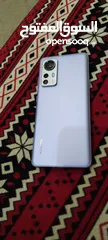  4 Xiaomi 12 رام 12 +8