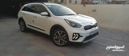  17 كيا نيرو 2021 جمرك جديد وارد كوري ممشي 32  الف فحص كامل جنطات تورنج