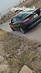  12 Ford Fusion Black سعر مميز