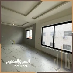  11 شقة طابق اول للبيع في تلاع العلي بالقرب اسواق السلطان مساحه200م .