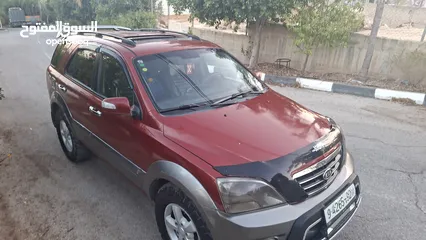  4 جيب كايا سورنتو موديل 2008_(ركاب 6+1)ديزل ماتور 2500دفع رباعي فل فل اضافات مع فتحة سقف مميز من الاخر