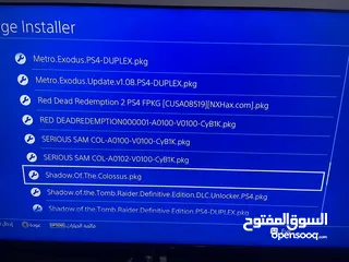  12 بلاي ستيشن PS4 Slim جهاز مع يد اصلية  معدل عليه فل بكج العاب ومعو هاردسك عليه العاب بسعر 160JD