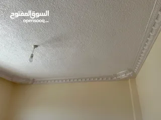  11 شقه طابقيه غير مسكونه للبيع فالكرك منطقه المرج