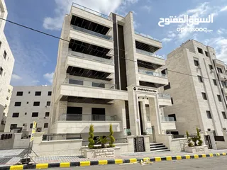  2 شقة طابق شبه ارضي للبيع مساحة 200م مع ترس وحديقه وكراج 250م بأجمل مناطق خلدا (مشروع 114