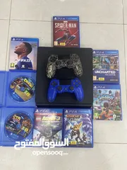  1 Playstation 4 Slim with 2 controllers and 8 CD