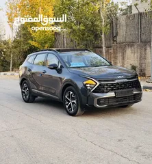  4 كيا سبورتاج هايبرد 2023 فل كامل مع بانوراما - باللون المميز والداخلية المميزة - والسعر المميز