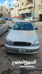  5 سيارة دايو لانوس اوتوماتيك موضيل 2002 متور 1.6 مرخصة مأمنة ، السيارة لعبة