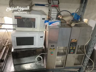  9 Kitchen machines and steel furniture for sale