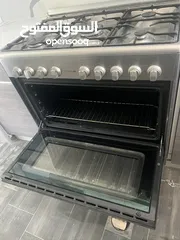 2 غاز + فرن Thomson كبير 90 سم، شغال ممتاز للبيع