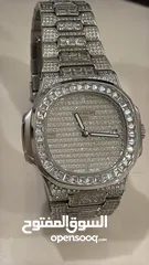  1 patek philippe nautilus  iced automatic
