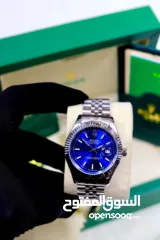  2 ساعات رولكس العالمية  مختومة   تشمل  : العلبة المتوفرة بالصورة  الاوراق كامله