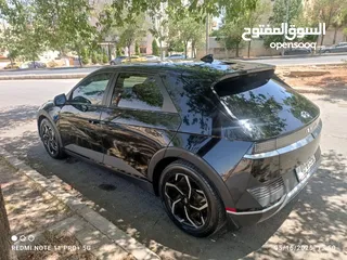  17 سياره موديل 2022 ايونك 5 كهربائيه لون اسود ميتاليك دفع رباعي اكبر بطاريه تمشي فوق 550 كيلو سبعه جيد
