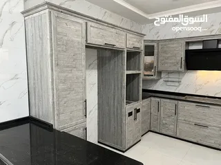  26 مطابخ خشب  مطابخ اللمنيوم أماراتي بجميع الألوان بكفالة 10 سنوات