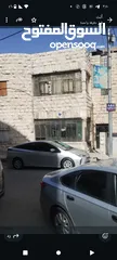  2 ارض تجاري عليها بناء طابقين