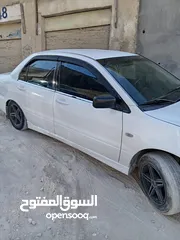  9 ميتسوبيشي لانسر 2003