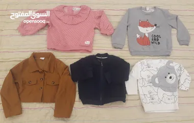  2 200  قطعة ملابس مستعملة أطفالى