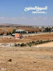  2 للبيع ارض بجانب جامعة اربد الاهلية مع اجمل اطلالة ومقابل جامعة جدارا مفروزة قوشان مستقل شارعيين