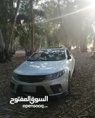  1 كيا فورتي كوبيه 2010 ميوزك من المالك شخصيا لون سيلفر بحالة ممتازة للبيع