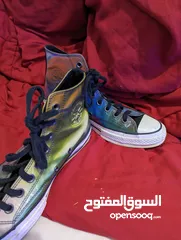  2 converse holographic shoes