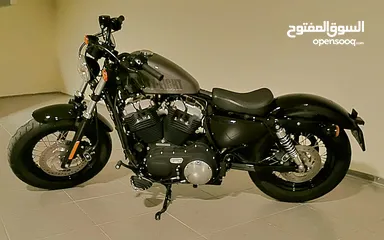  1 Harley Davidson sporster fourty eight 2011 good condition black plus exost