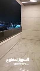  31 شقه فخمه 170م ثاني فني للبيع على شارع البترا بالقرب من اربد مول قراند مقابل بيت البن البرازيلي