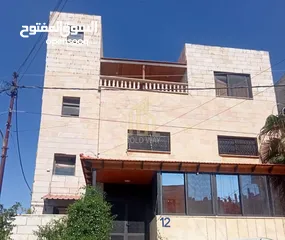  11 في أهدأ مناطق صافوط عمارة للبيع مكونة من أربع طوابق وتشطيبات راقية/ ref 9012