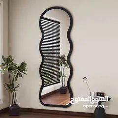  6 مرايا ترند عالمياً... تصميم موجي ومنحوت فخم يخلي أي زاوية تصير قطعة فن جاهزة للتصوير  انعكاس نقي