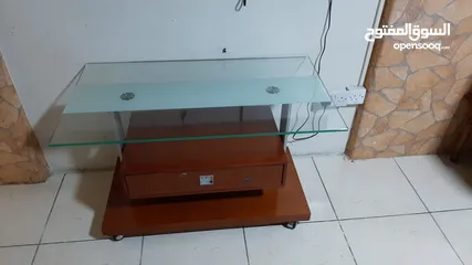  1 tv table with drawer