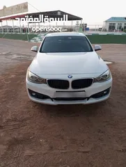  1 Bmw model 2014 328i used good condition kilometers 173000